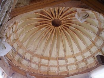 Spray foam applied to a curved ceiling